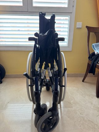 silla de ruedas manual con motor incorporado