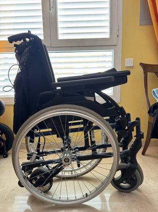 silla de ruedas manual con motor incorporado