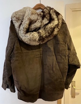 Abrigo de piel vintage con capucha chiporro