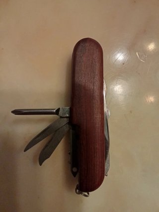 Coltellino multiuso in legno Con 11 funzioni