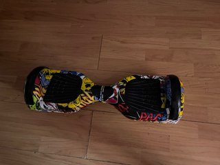 Hoverboard con funda azul con negro y cargador