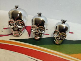 3 bottigliette teschio argento