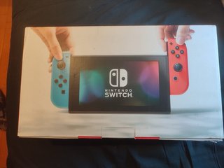 Nintendo Switch v1 con base y mando(incluye caja)