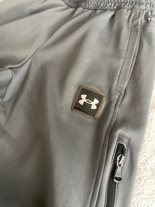 Pantalones Under Armour Talla M Grises