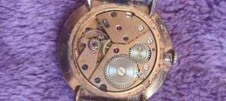 Reloj TucahDorado y Plateado