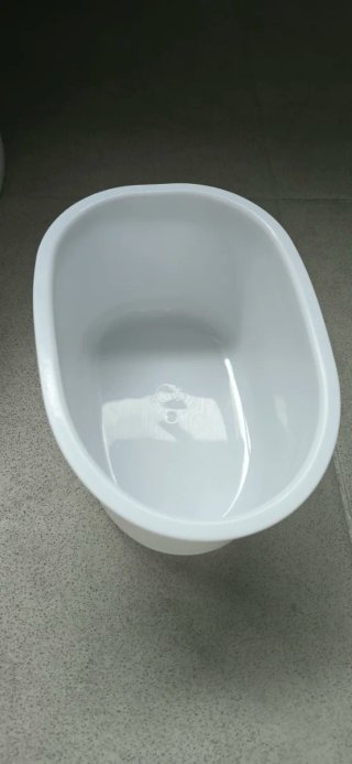 Orinal infantil con forma de baño
