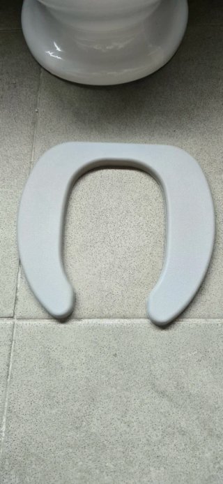 Orinal infantil con forma de baño