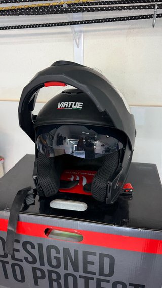 Cascos de moto verde sin estrenar