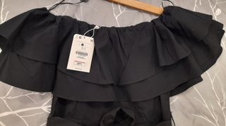 Mono Bershka negro volantes y cinturón
