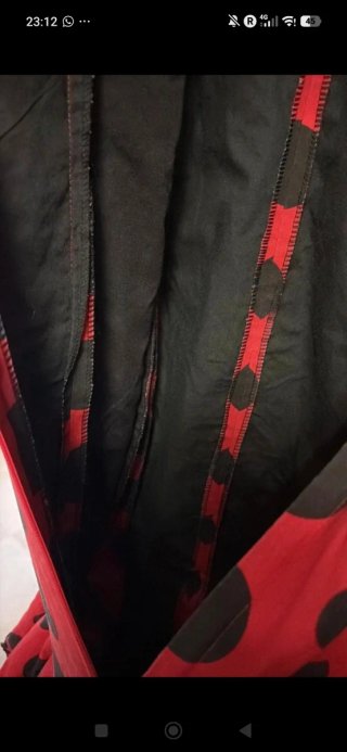 Vestido de Flamenca lunares rojo y negro.