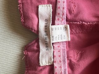 Pantalón vaquero corto de color rosa de mujer