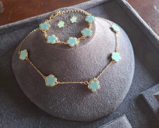 Set gioielli fiore azzurro e oro