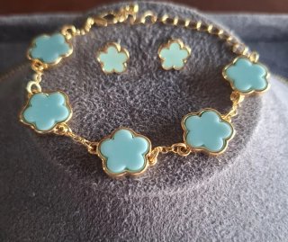 Set gioielli fiore azzurro e oro