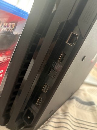 PlayStation 4 Pro Negra + Juegos + mandos y funda