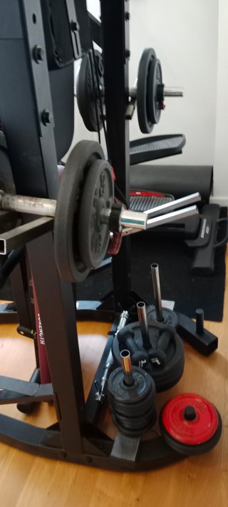 Elíptica multifuncional con pesas