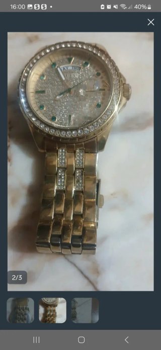 Anillo Guess dorado con baño de oro con Circonitas
