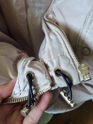 Abrigo acolchado plumas beige