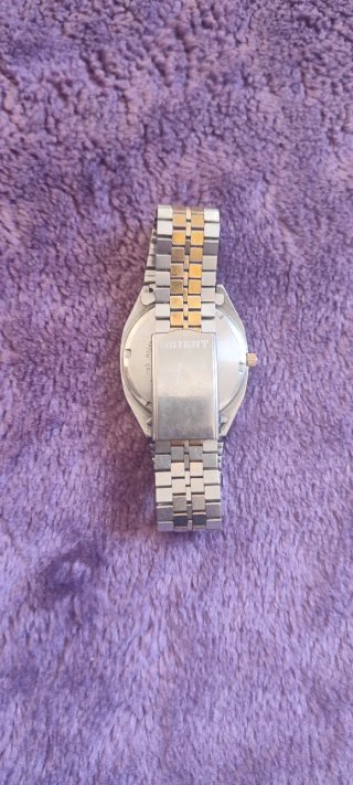 Reloj Orient Quartz Oro y Plata