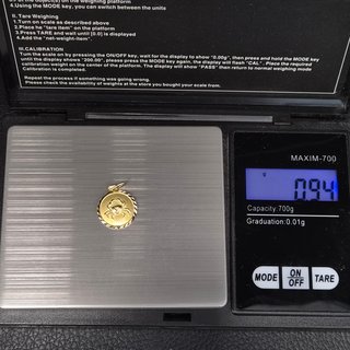 Colgante de oro de 18k. Zodiaco Cáncer. 0.94gr.