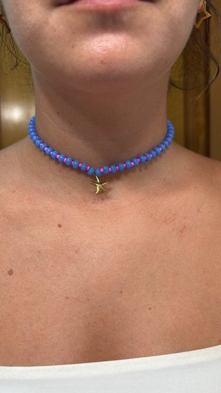 Collar hecho a mano con estrella.