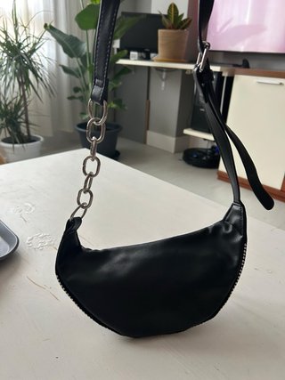 Riñonera de pedrería negra y plateada