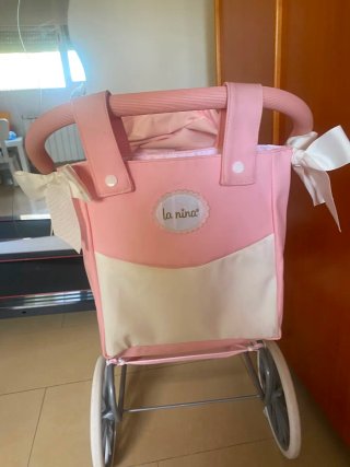 Carro de juguete rosa La Nina