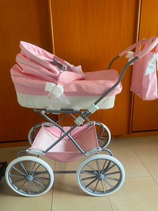 Carro de juguete rosa La Nina