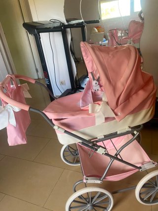 Carro de juguete rosa La Nina