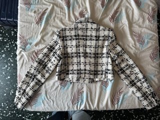 Chaqueta de tweed nueva.