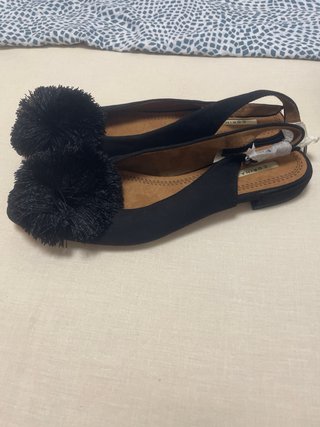 Manolitinas negras con pompón