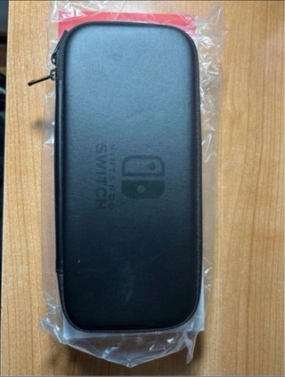 Nintendo Switch + Funda Oficial + Super Mario Odes