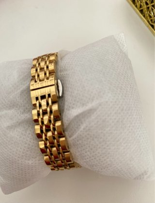 Reloj dorado mujer