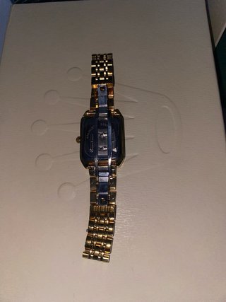 Reloj dorado mujer