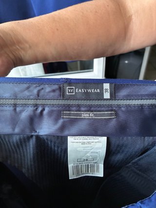 Traje azul chaqueta y pantalón con camisa