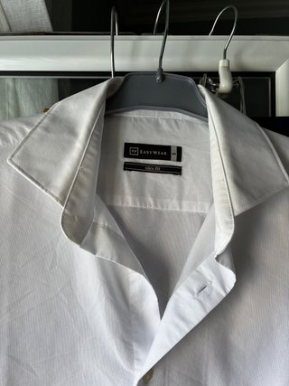 Traje azul chaqueta y pantalón con camisa