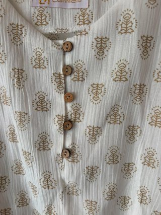 Top LAMIS Talla M/L en la etiqueta Beige/Blanco