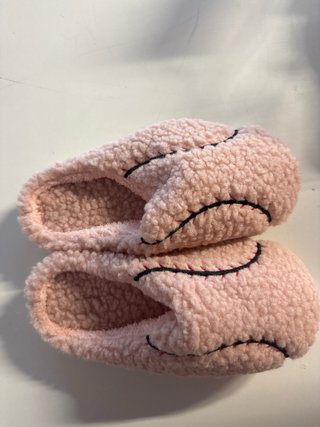 Pantofole rosa a forma di pallone
