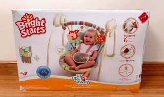 Mecedora infantil con juguetes