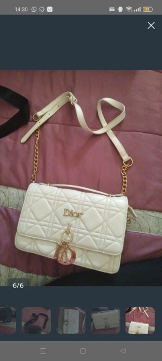 Bolso Guess Negro y Dorado y Dior en blanco