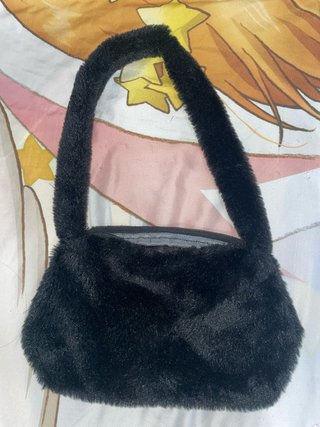 Bolso negro pelo
