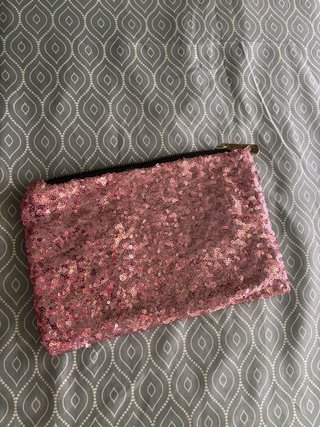 Bolso de mano con lentejuelas rosa y dorado