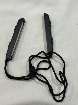 Grip/mando + correas originales Nintendo Switch