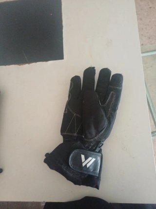 Chaqueta de moto negra y verde con guantes Talla S