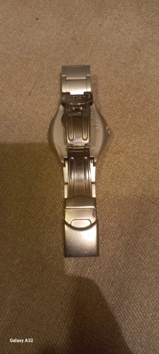 Reloj Swatch Mujer Plata y Blanco