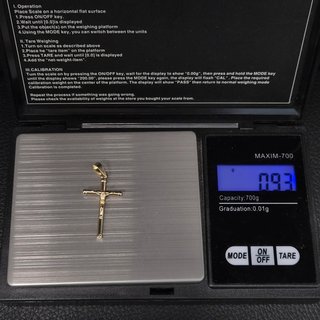 Colgante de oro de 18k. Cruz. 0.93 gr.