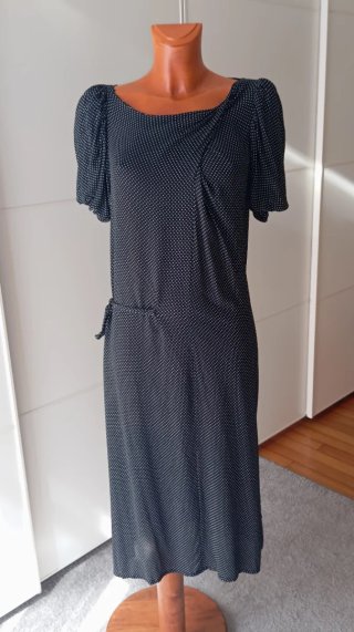Vestido vintage negro lunares blancos.