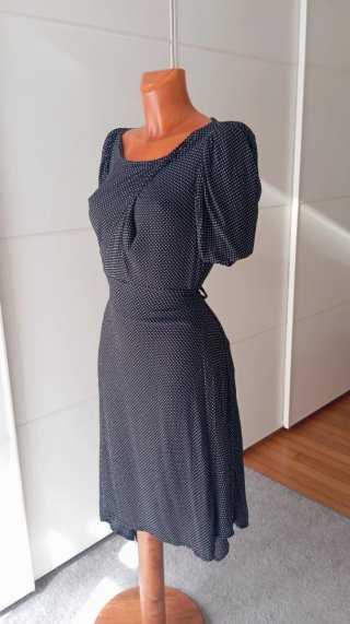 Vestido vintage negro lunares blancos.