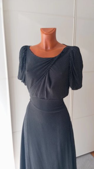 Vestido vintage negro lunares blancos.