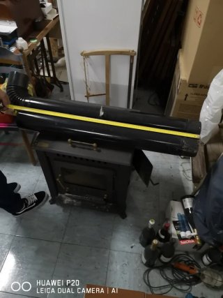 Estufa de leña hierro con puerta cristal