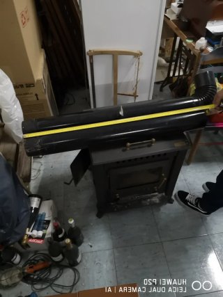 Estufa de leña hierro con puerta cristal